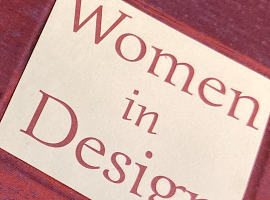 Close up on book titled Women in Design